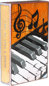 003 'Tickled Ivory'  "Life is like a piano. What you get depends on how you play it."  -Tom Lehrer